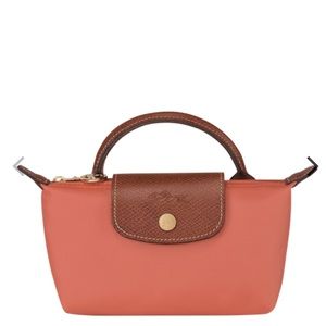 Longchalp pink colored cosmetic pouch.